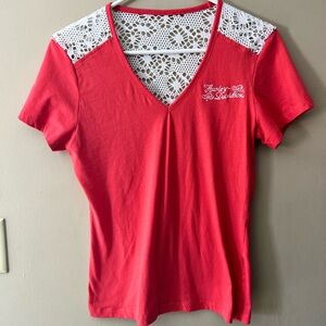 Harley Davidson short sleeve coral colored with crochet lace back accents shirt.